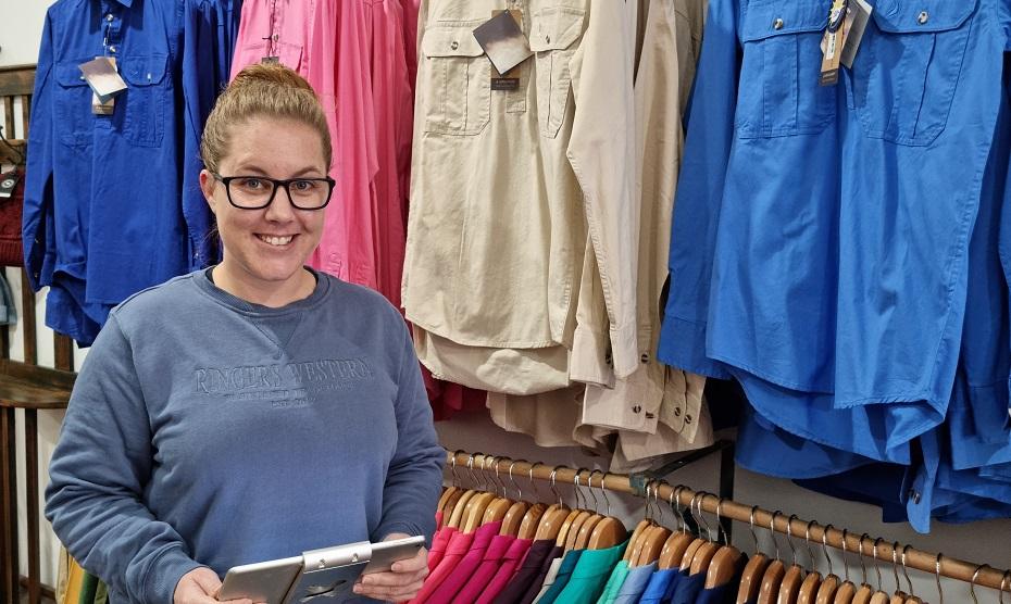 Rosie Siemer in her clothing and accessories boutique