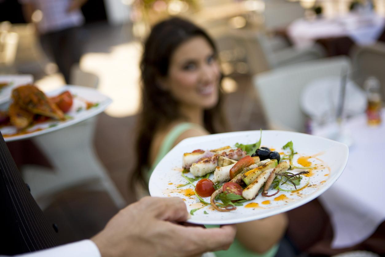 Woman being served
